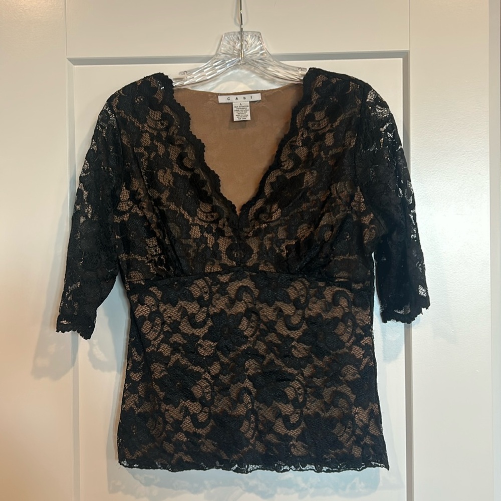 CAbi black lacy and classy short sleeve shirt. Size L.